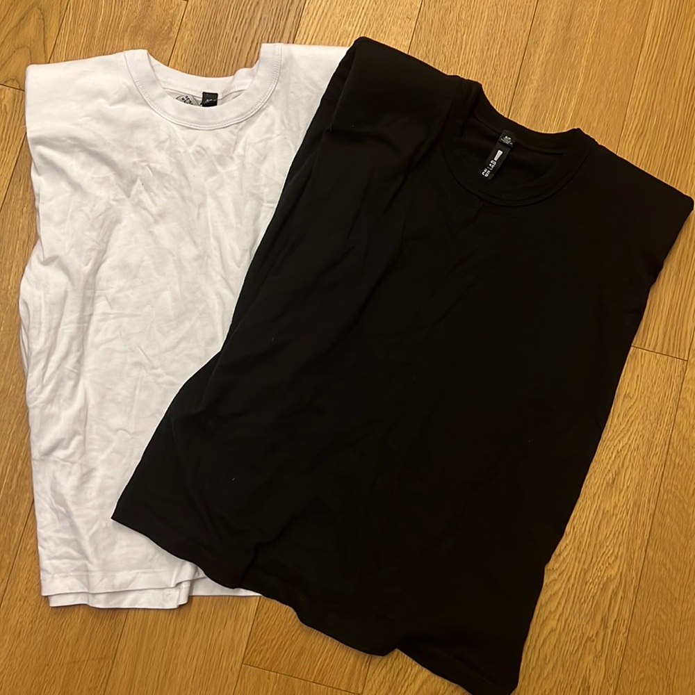 Set of shirts. Size: small. Black & white. Padded shoulder. Brand: Design Lab.